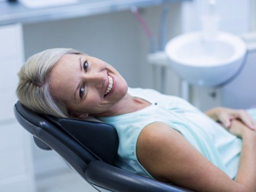 Woman smiling after lip tie and tongue tie treatment