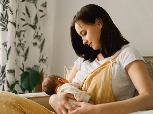 Mother nursing baby