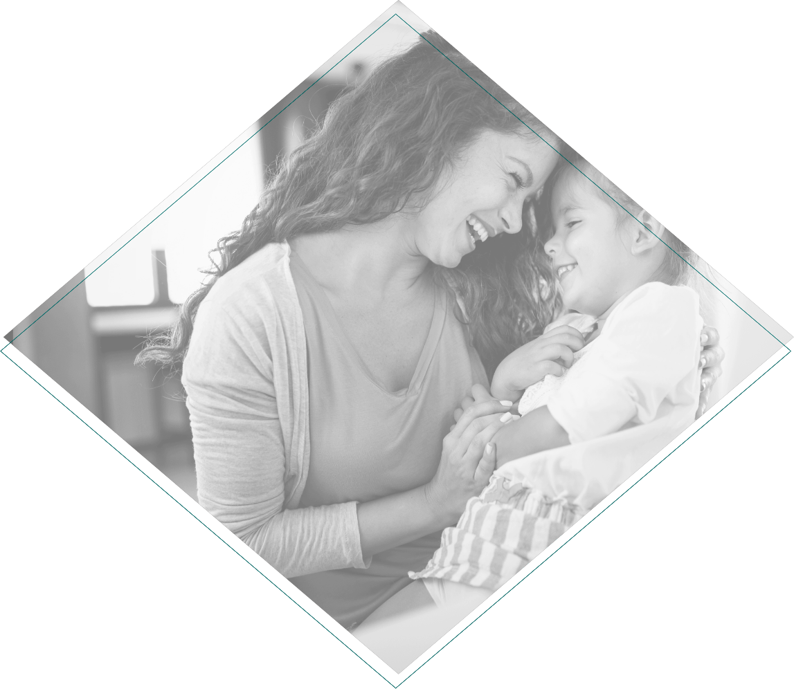 Mother smiling with child after lip and tongue tie treatment in Cleveland