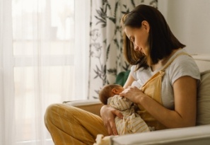 Mother nursing baby