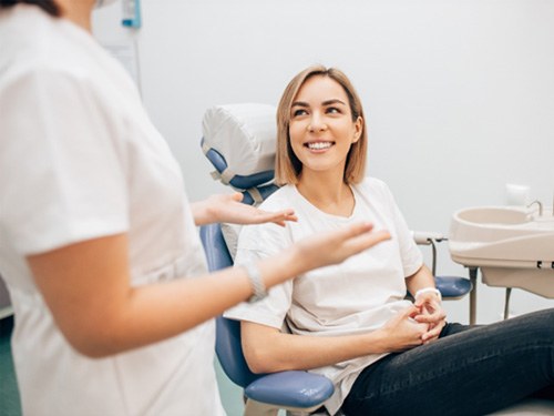 patient talking to dentist 