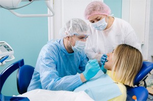 dentists working on patient 