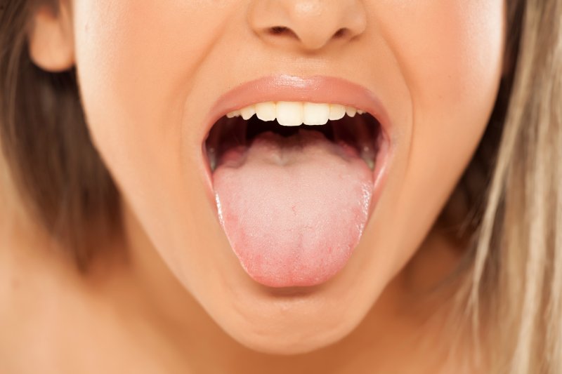 person with their tongue sticking out